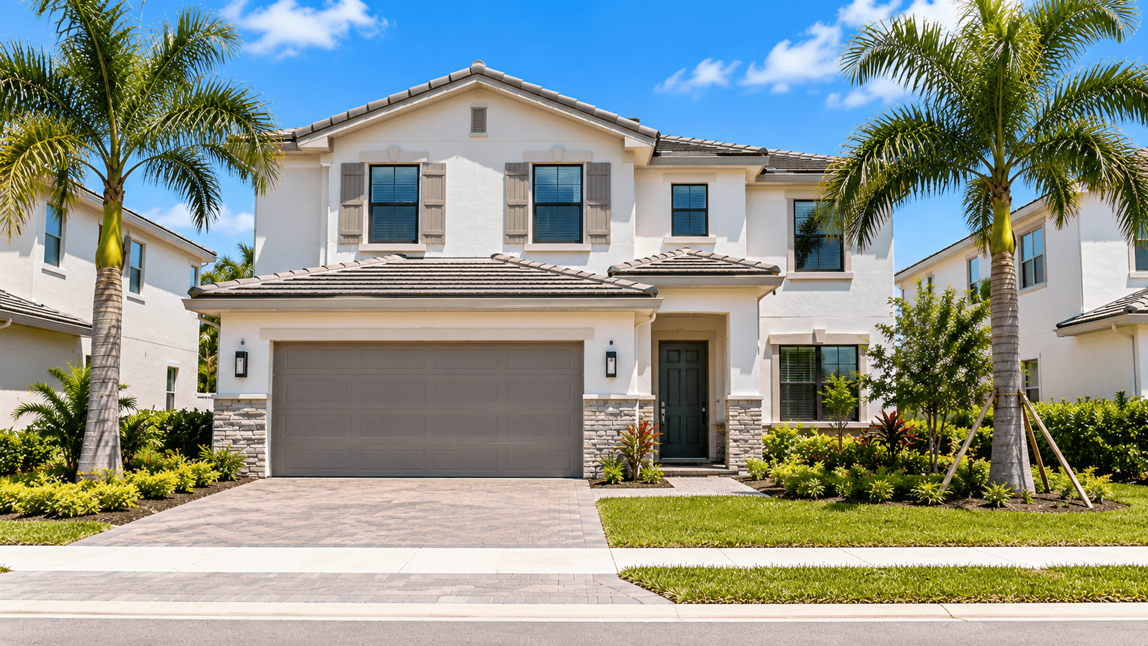 Front of an Orchard plan home at Acacia Groves in Homestead, Florida