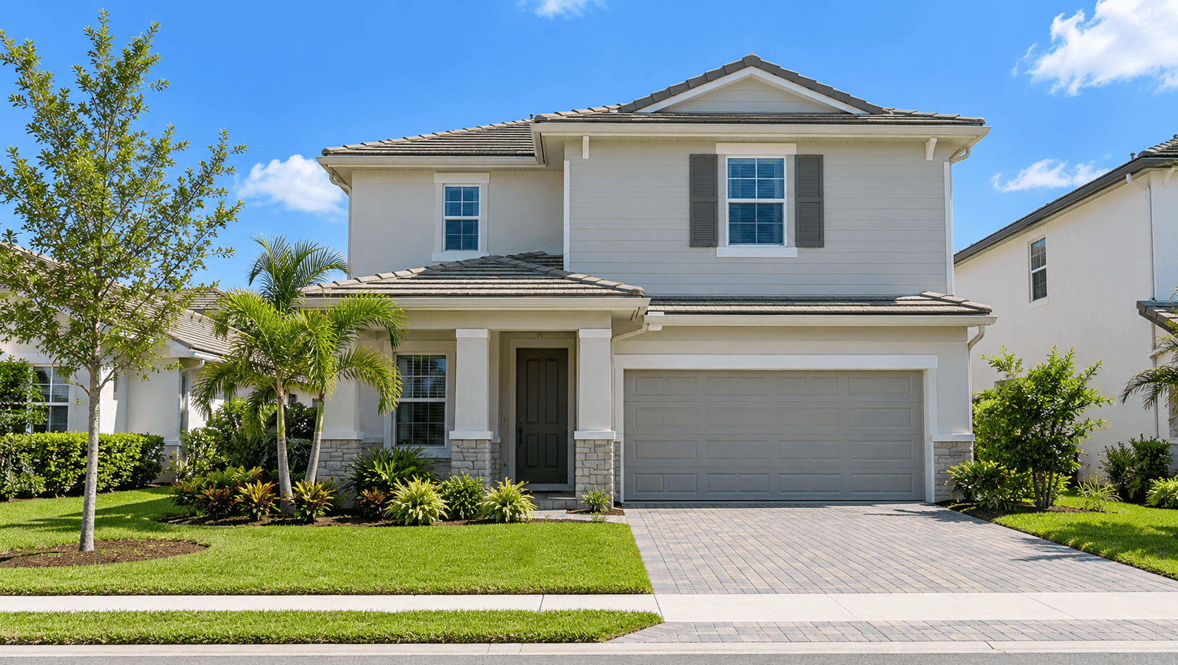 Single-family Lennar home on a street at Pepperwood in Stuart, Florida