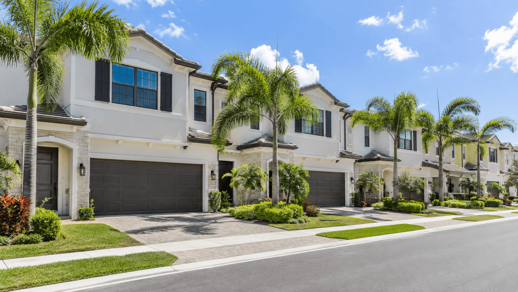 New townhomes on a street in Palm Beach Gardens, Florida