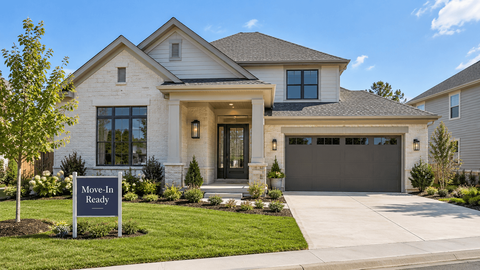 Move-in ready home exterior at Hendrix Reserve with a builder sign