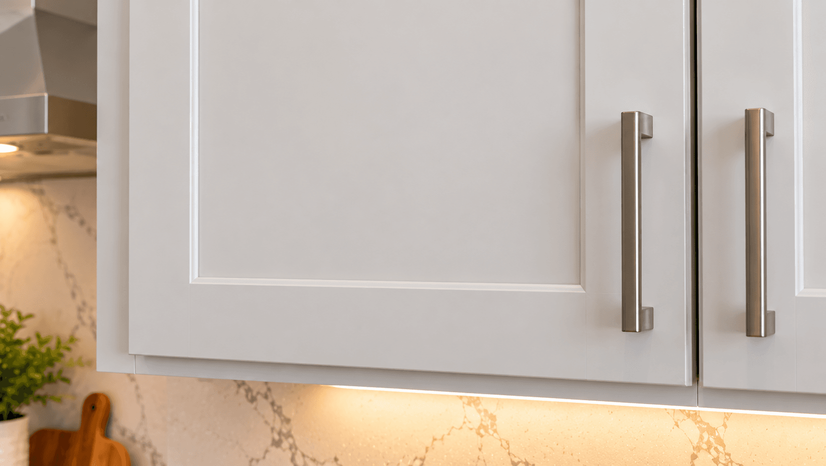 Shaker style upper cabinet door in a Pepperwood kitchen