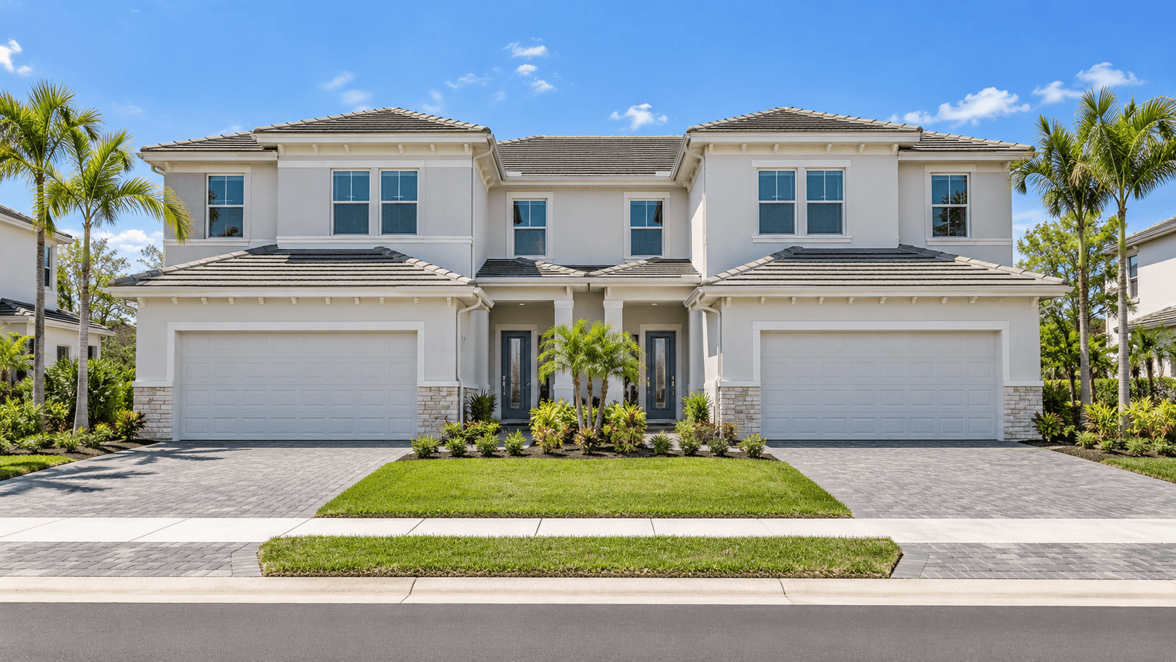 Front of a two-story Solea twin home at Coral Breeze